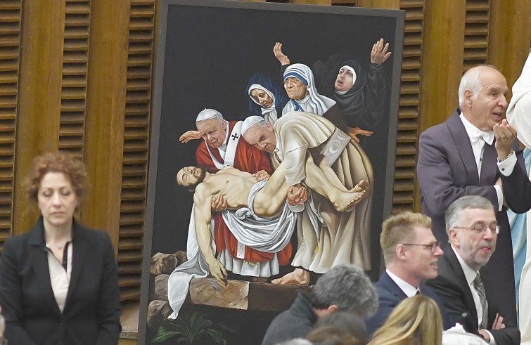 Aula Paolo VI, 23 novembre 2016: Udienza generale Papa Francesco -  quadro della pietà di Cristo con Papa Francesco, Papa Giovanni Paolo II, Madre Teresa